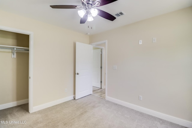 14667 Cable Bridge Rd, Gulfport, MS 39503 - unfurnished bedroom featuring light carpet, baseboards, a closet, and ceiling fan