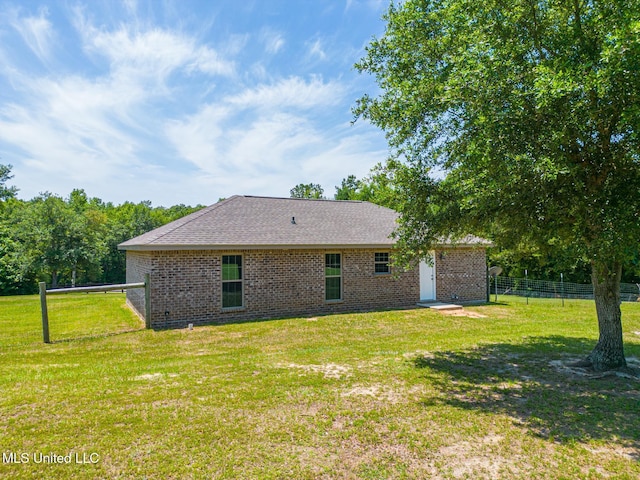 14667 Cable Bridge Rd, Gulfport, MS 39503 - back of house with brick siding and roof with shingles