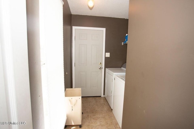 4181 Meadow Creek Dr, Horn Lake, MS 38637 - washroom featuring independent washer and dryer and light tile patterned flooring