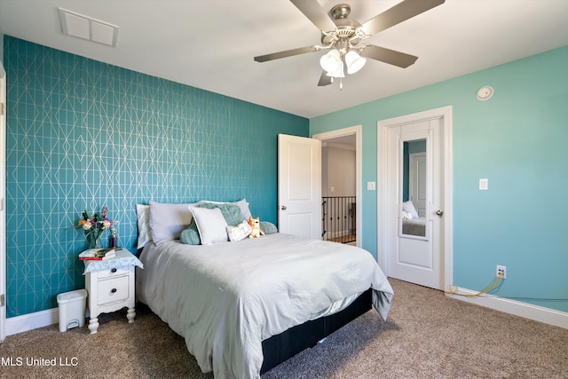 bedroom featuring a ceiling fan, carpet flooring, baseboards, and visible vents