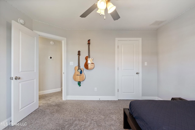 bedroom featuring visible vents, carpet floors, baseboards, and ceiling fan