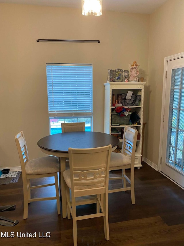 dining room featuring dark wood-type flooring