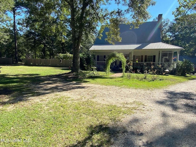 exterior space featuring a front yard and a porch