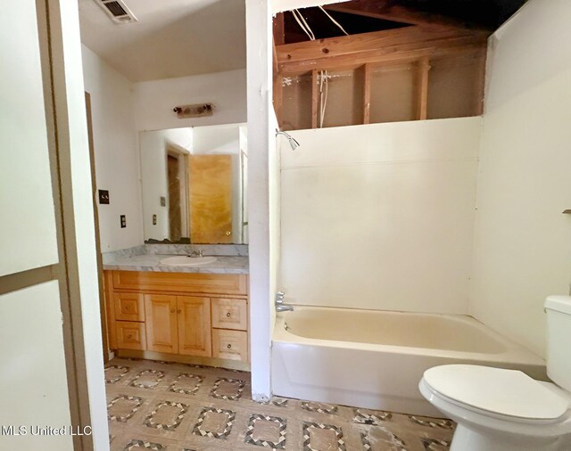 307 Pleasant Valley Dr, Vicksburg, MS 39180 - bathroom featuring toilet, shower / bathtub combination, and vanity