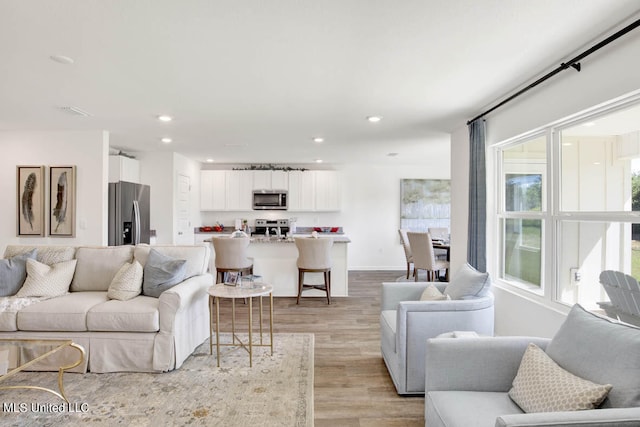 living room featuring light wood-type flooring