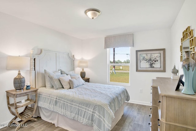 bedroom featuring hardwood / wood-style floors