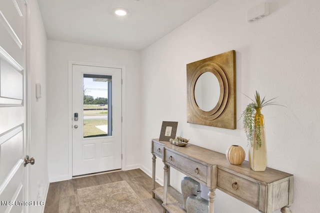 entryway with light hardwood / wood-style flooring