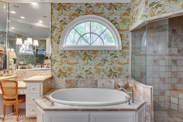 bathroom featuring crown molding and separate shower and tub