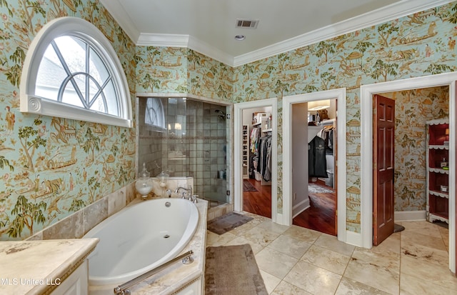 bathroom featuring shower with separate bathtub, crown molding, tile patterned floors, and vanity