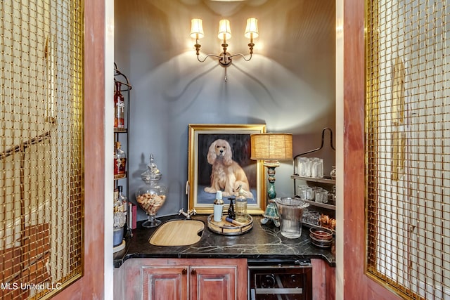 bar featuring wine cooler and sink