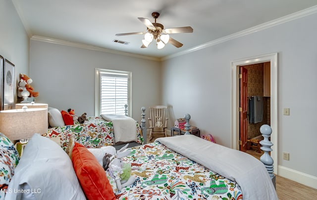 carpeted bedroom with ceiling fan and ornamental molding