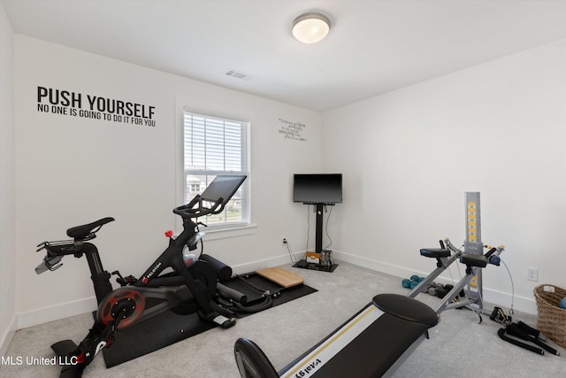 4975 Longmire Ln, Olive Branch, MS 38654 - exercise room with baseboards and carpet flooring
