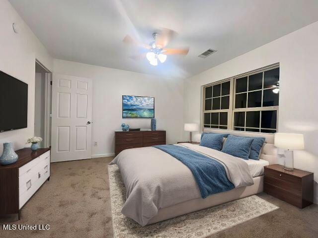 carpeted bedroom featuring ceiling fan