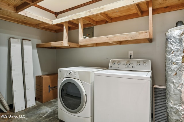 laundry area featuring washer and clothes dryer