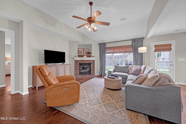 13245 Braybourne Pkwy, Olive Branch, MS 38654 - living area featuring baseboards, dark wood-style floors, a ceiling fan, plenty of natural light, and vaulted ceiling