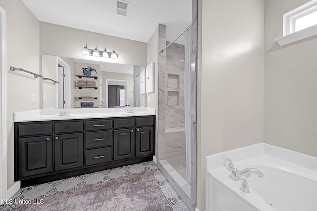 13245 Braybourne Pkwy, Olive Branch, MS 38654 - full bath featuring a bath, a stall shower, and double vanity
