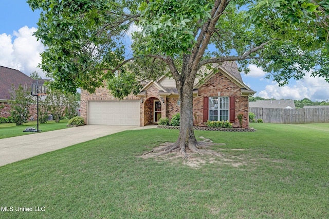 13245 Braybourne Pkwy, Olive Branch, MS 38654 - view of front of house with concrete driveway, brick siding, and a garage