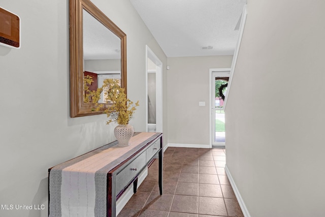 13245 Braybourne Pkwy, Olive Branch, MS 38654 - corridor with tile patterned floors and baseboards