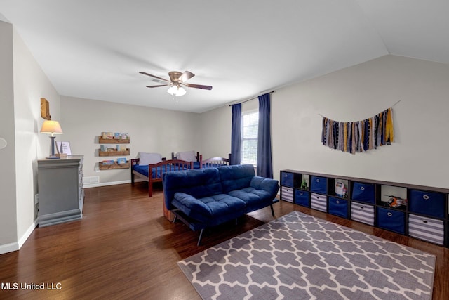 13245 Braybourne Pkwy, Olive Branch, MS 38654 - living room with wood finished floors, a ceiling fan, lofted ceiling, and baseboards