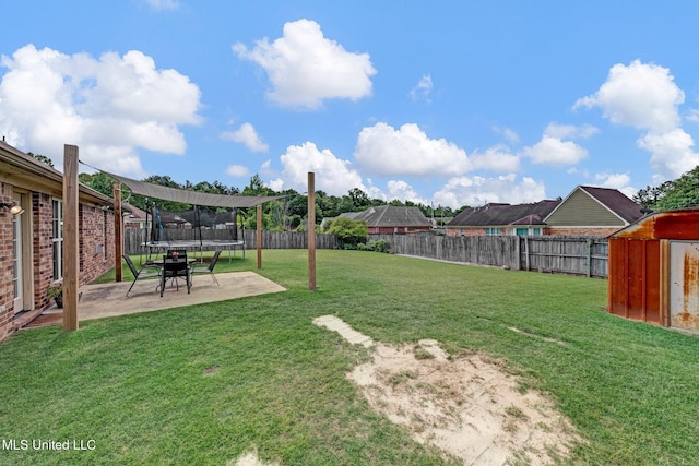 13245 Braybourne Pkwy, Olive Branch, MS 38654 - view of yard with a patio and a trampoline
