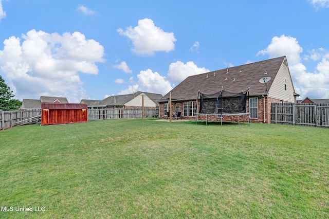13245 Braybourne Pkwy, Olive Branch, MS 38654 - view of yard with a trampoline