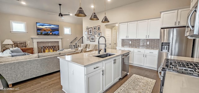 13453 Birch Bnd, Olive Branch, MS 38654 - kitchen with a sink, open floor plan, stainless steel appliances, plenty of natural light, and recessed lighting