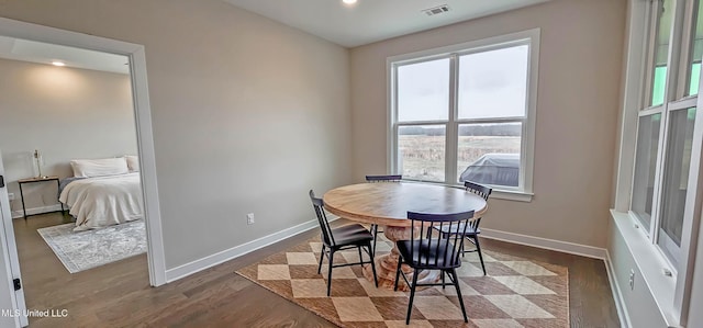 13453 Birch Bnd, Olive Branch, MS 38654 - dining space featuring baseboards, wood finished floors, and recessed lighting