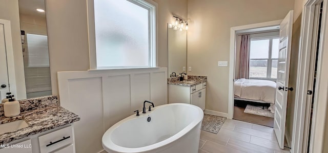 13453 Birch Bnd, Olive Branch, MS 38654 - full bath featuring two vanities, a soaking tub, and ensuite bath