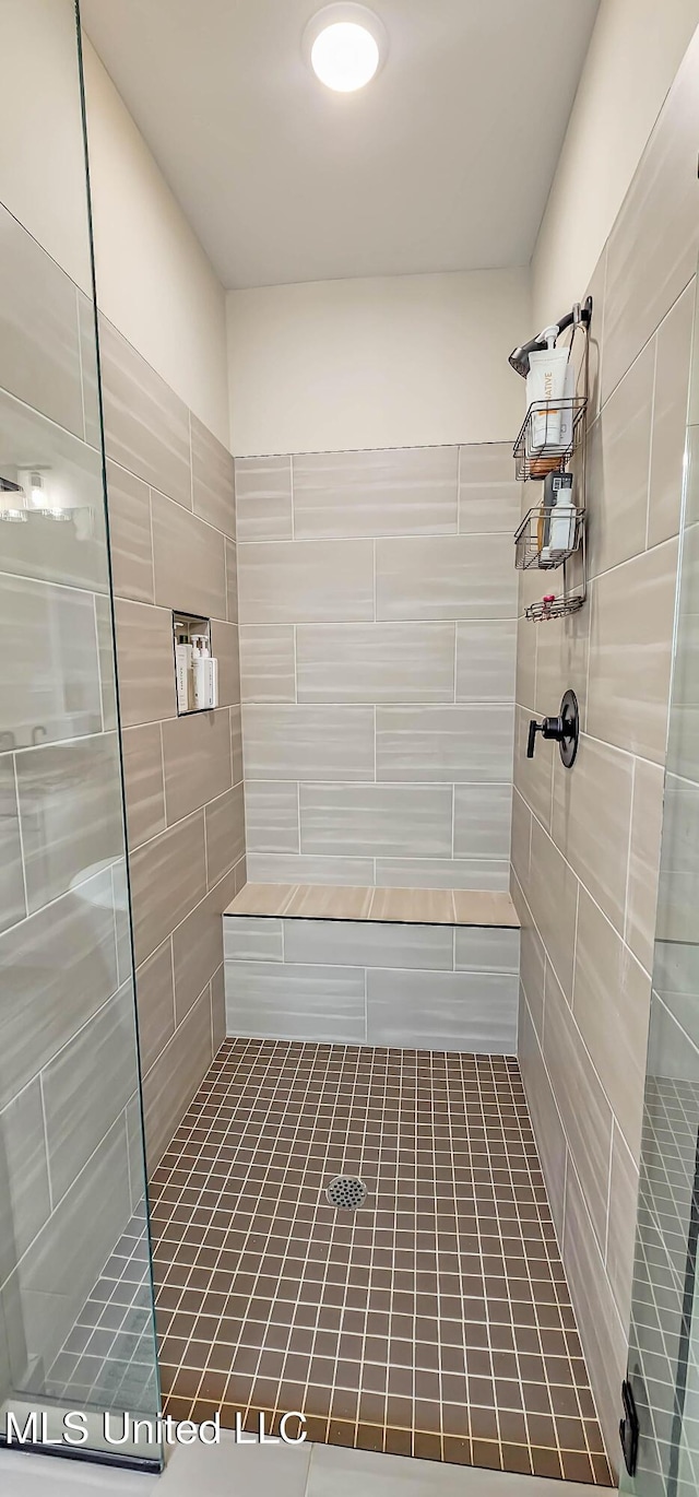 13453 Birch Bnd, Olive Branch, MS 38654 - full bath featuring tiled shower and tile patterned flooring
