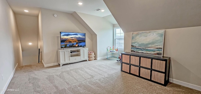 13453 Birch Bnd, Olive Branch, MS 38654 - living room with carpet, lofted ceiling, baseboards, and recessed lighting
