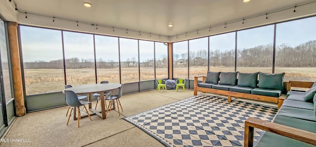 13453 Birch Bnd, Olive Branch, MS 38654 - sunroom / solarium featuring an outdoor living space, recessed lighting, a view of rural / pastoral area, and speckle patterned floor