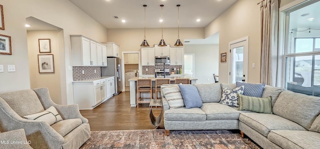 13453 Birch Bnd, Olive Branch, MS 38654 - living area featuring dark wood-style flooring and recessed lighting
