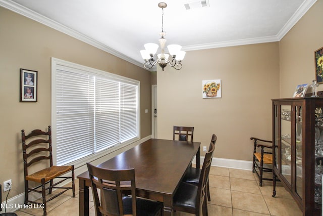 dining room featuring ornamental molding, a chandelier, and light tile patterned flooring