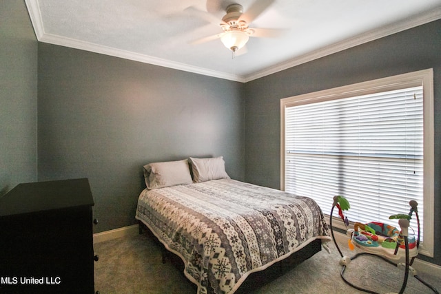 carpeted bedroom featuring crown molding and ceiling fan