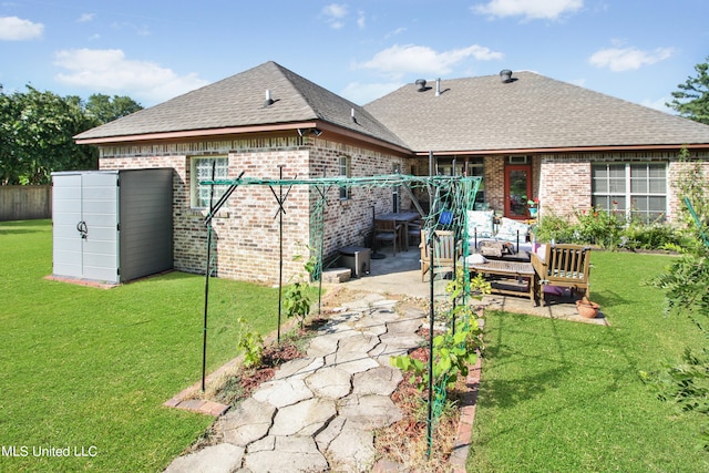 back of property featuring a patio, a lawn, and outdoor lounge area