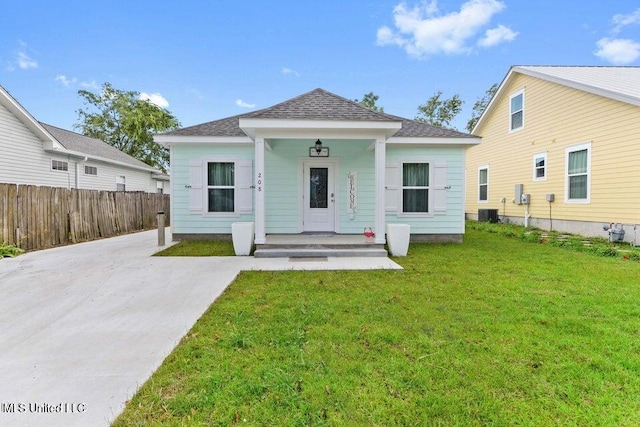208 Sycamore St, Bay Saint Louis, MS 39520 - back of property with roof with shingles