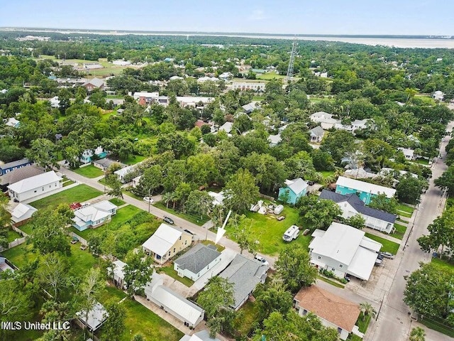 208 Sycamore St, Bay Saint Louis, MS 39520 - aerial perspective of suburban area featuring a large body of water
