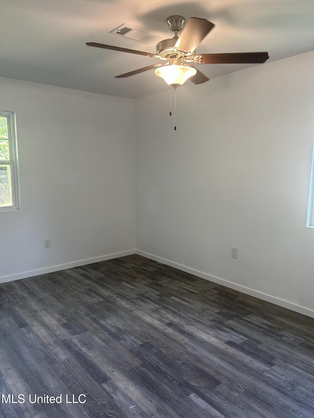 5736 Eastwood Dr, Moss Point, MS 39563 - unfurnished room with dark wood-style flooring and ceiling fan