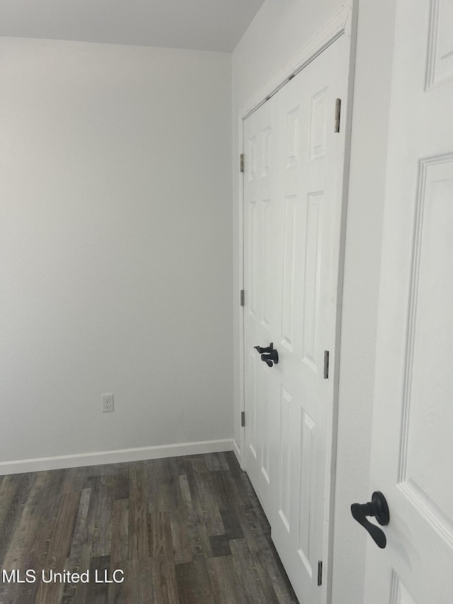 5736 Eastwood Dr, Moss Point, MS 39563 - empty room featuring dark wood-style floors and baseboards