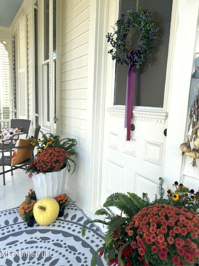 612 State St, Natchez, MS 39120 - property entrance with covered porch