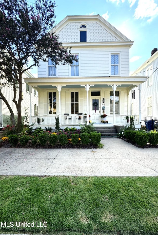 612 State St, Natchez, MS 39120 - victorian house with a porch