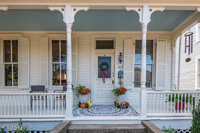 612 State St, Natchez, MS 39120 - entrance to property featuring covered porch