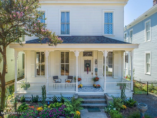 612 State St, Natchez, MS 39120 - view of front of home with a porch and roof with shingles