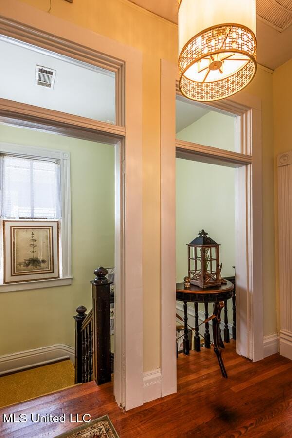 612 State St, Natchez, MS 39120 - hall with wood finished floors and baseboards
