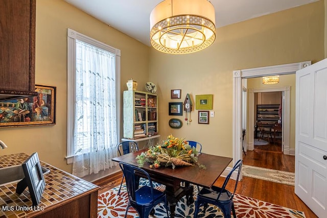 612 State St, Natchez, MS 39120 - dining area featuring wood finished floors