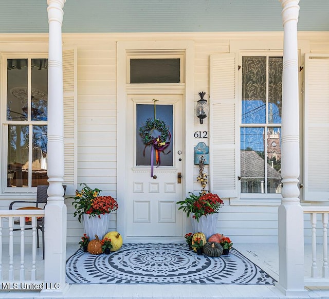612 State St, Natchez, MS 39120 - property entrance with covered porch