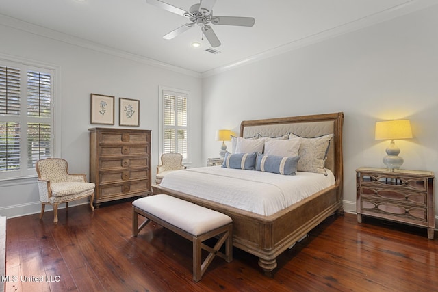 bedroom featuring visible vents, hardwood / wood-style flooring, recessed lighting, crown molding, and baseboards