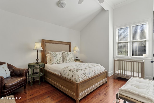 bedroom with lofted ceiling with beams, wood finished floors, baseboards, and ceiling fan