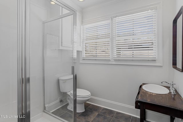 full bath featuring baseboards, toilet, a stall shower, tile patterned floors, and vanity