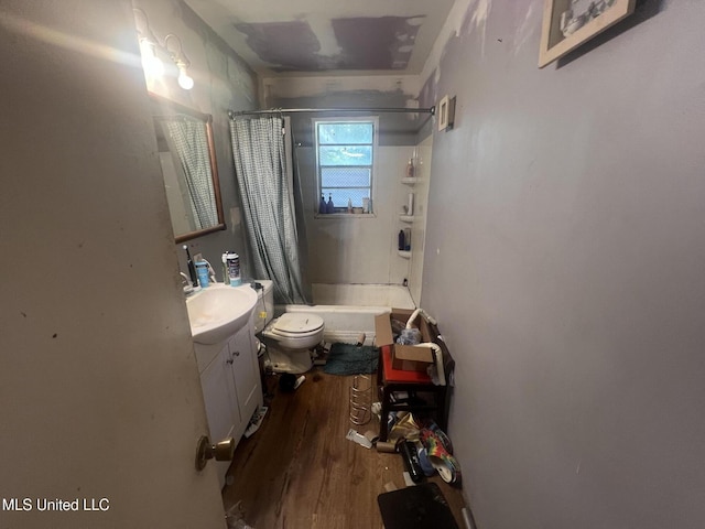 4008 Somerset Dr, Moss Point, MS 39562 - full bathroom featuring vanity, wood finished floors, and shower / bathtub combination with curtain